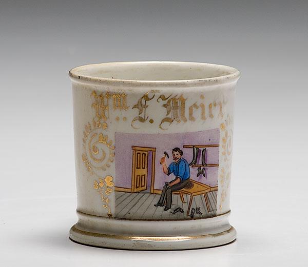 Appraisal: COBBLER'S OCCUPATIONAL SHAVING MUG porcelain with polychrome painted scene of