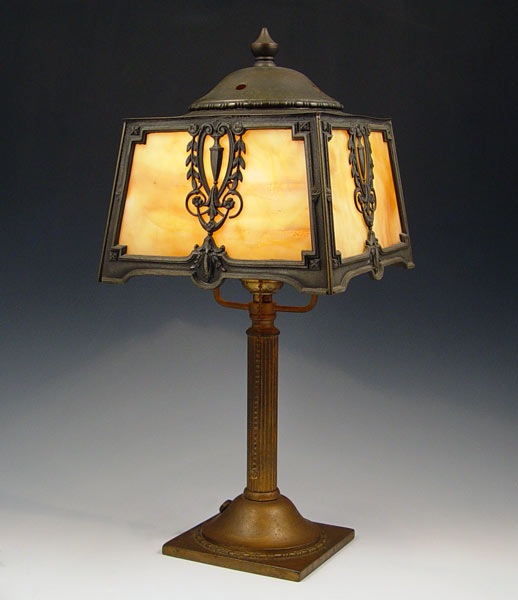 Appraisal: VINTAGE SLAG GLASS DESK LAMP Four panel shade bronzed metal