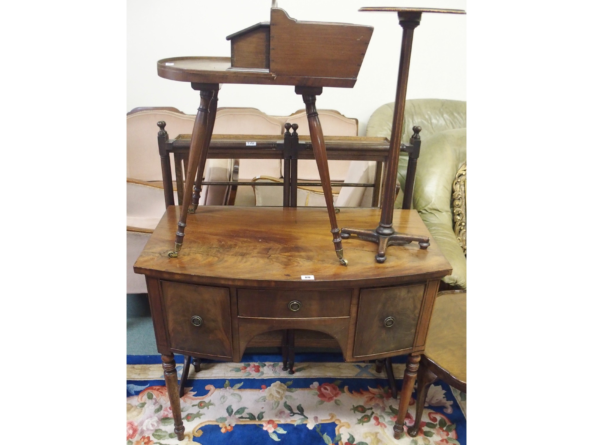 Appraisal: A mahogany bow front dressing table an oak shoe rack