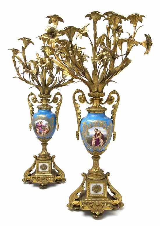 Appraisal: A Pair of Sevres Style Gilt Bronze Mounted Seven-Light Candelabra