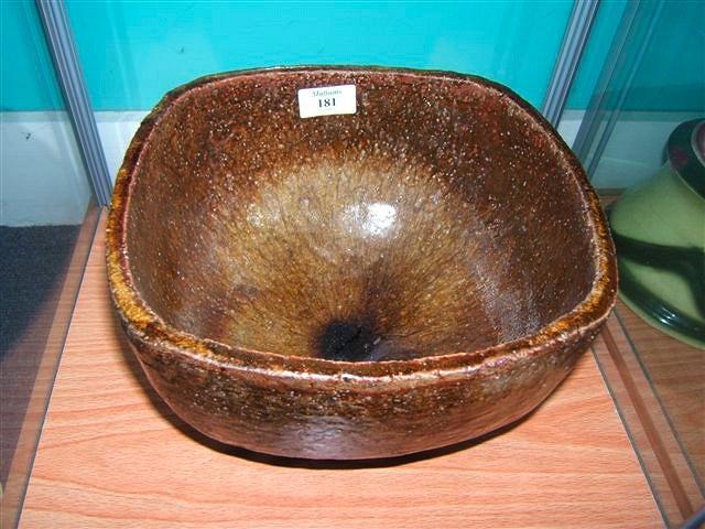 Appraisal: A studio pottery ash glazed bowl wide