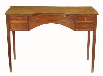 Appraisal: A mahogany concave front dressing table in Regency style with