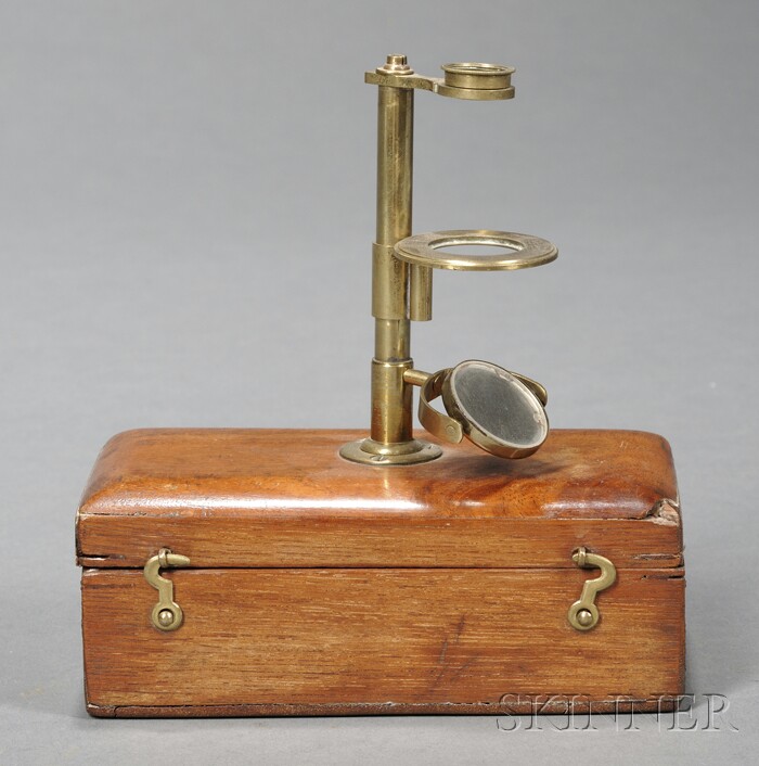 Appraisal: Brass Naturalist's Microscope England c the pillar mounts at the