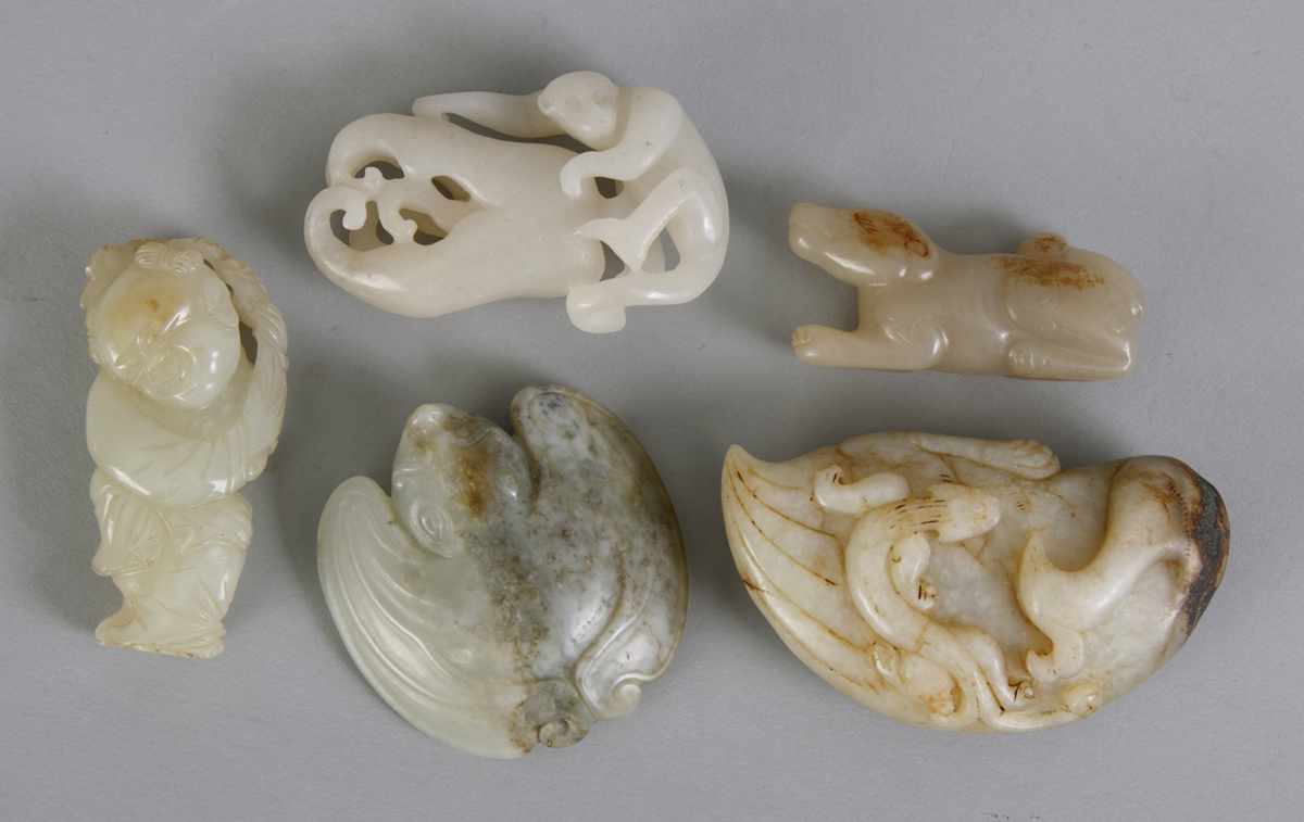 Appraisal: Group of Carved Jade Items Clockwise from left Jade boy