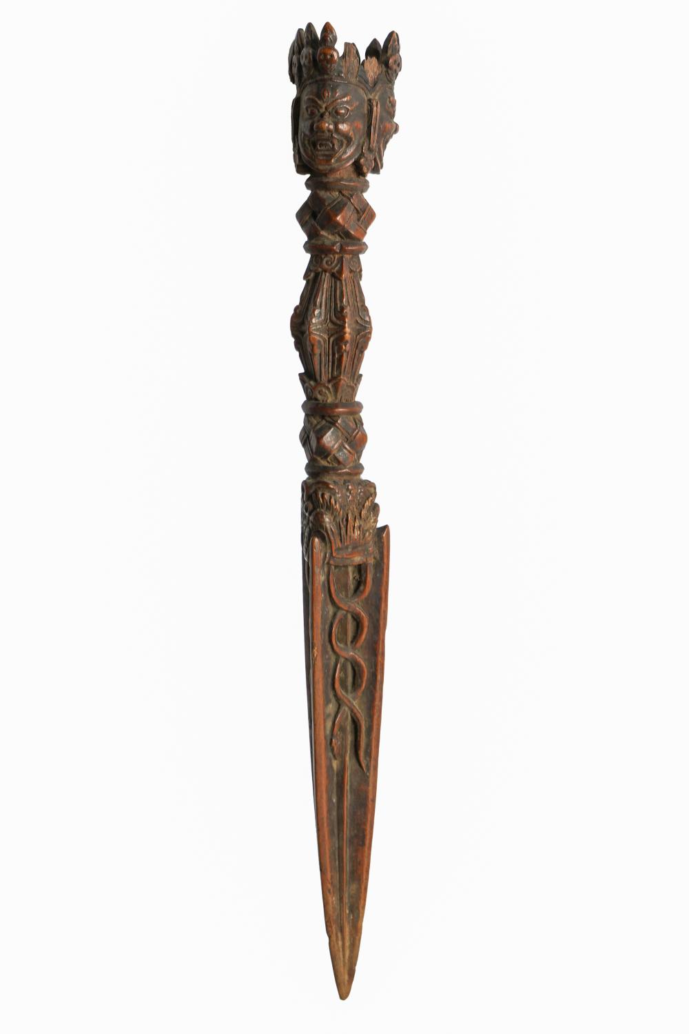 Appraisal: TIBETAN WOOD CARVED DAGGERCondition with areas of wear throughout inches