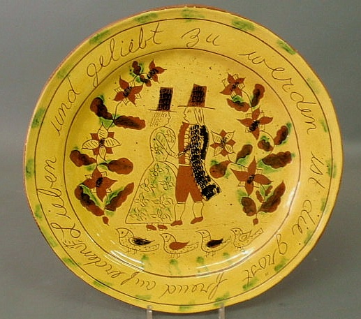 Appraisal: Lester Breininger pottery Pennsylvania German redware charger with sgraffito decoration