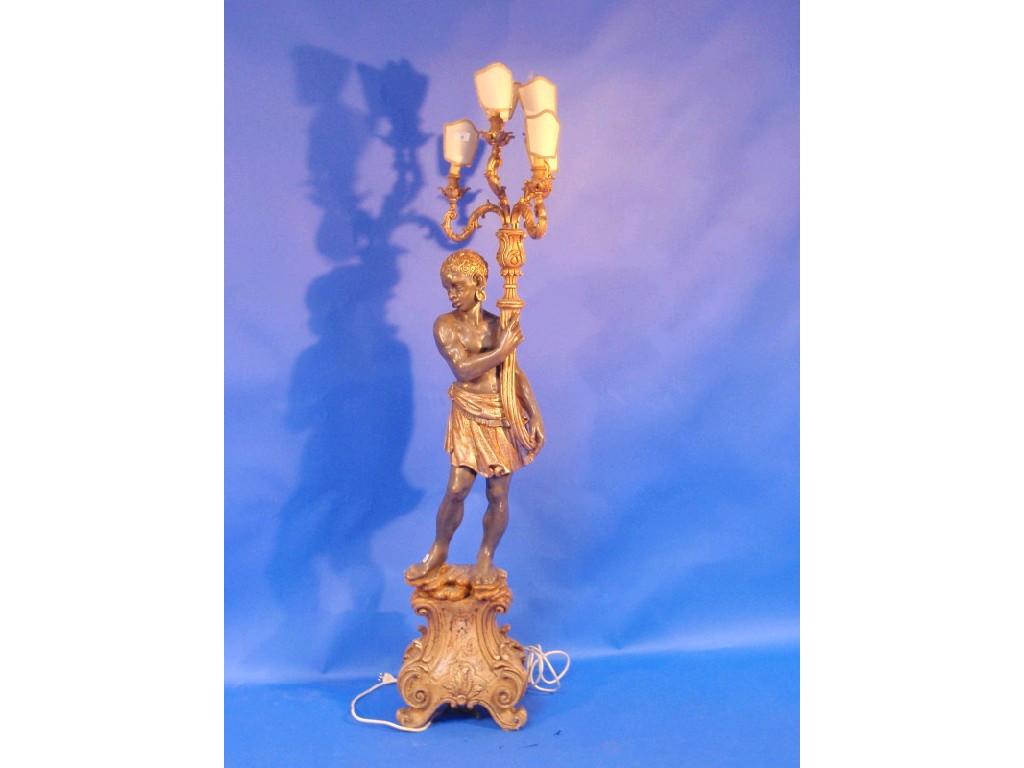 Appraisal: An Italian carved wooden Blackamoor standard lamp figure c m