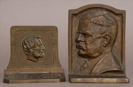 Appraisal: TWO RELIEF-CAST METAL BOOKENDS The one of Abraham Lincoln and