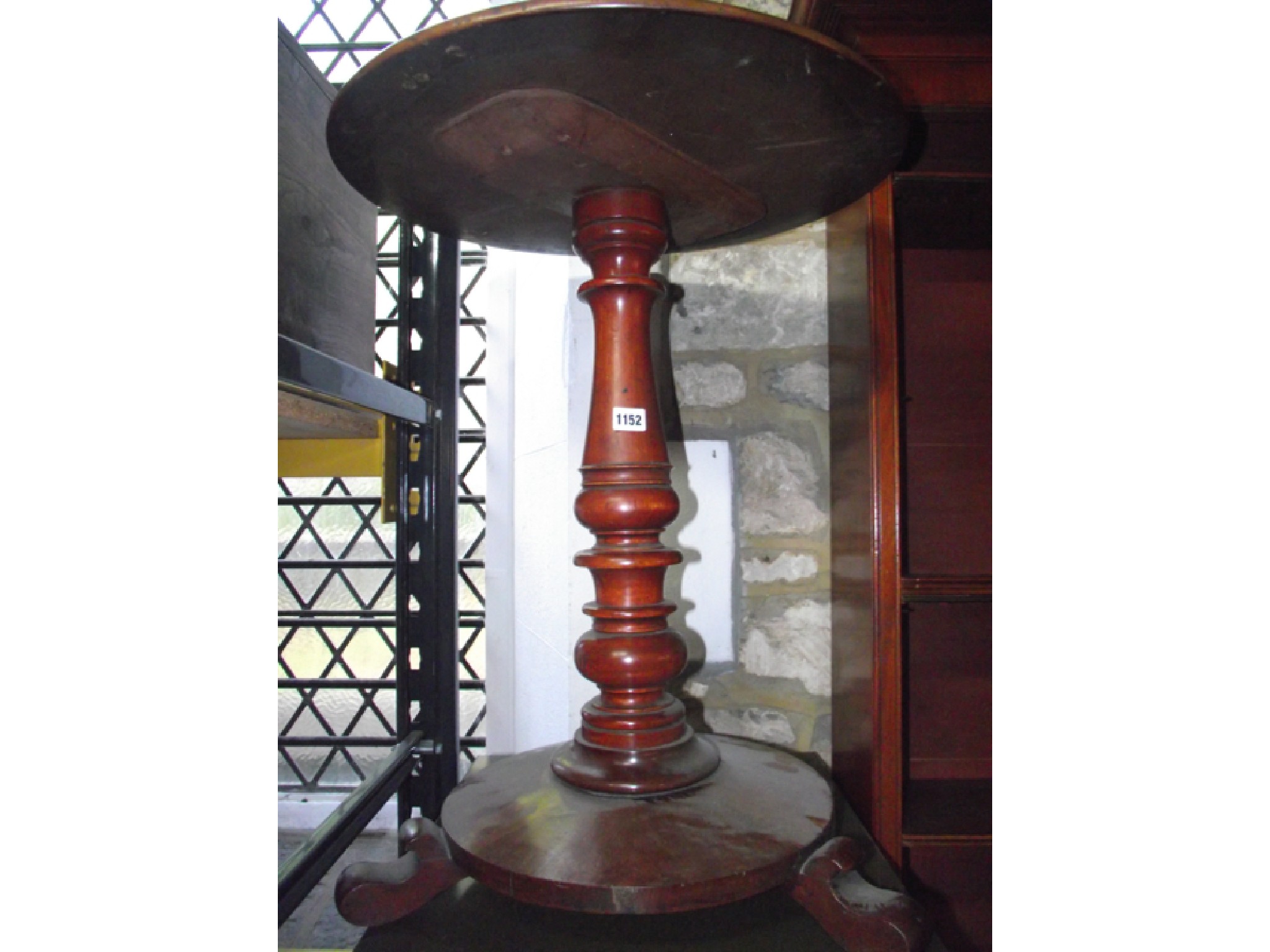 Appraisal: A Victorian mahogany occasional table the circular top raised on