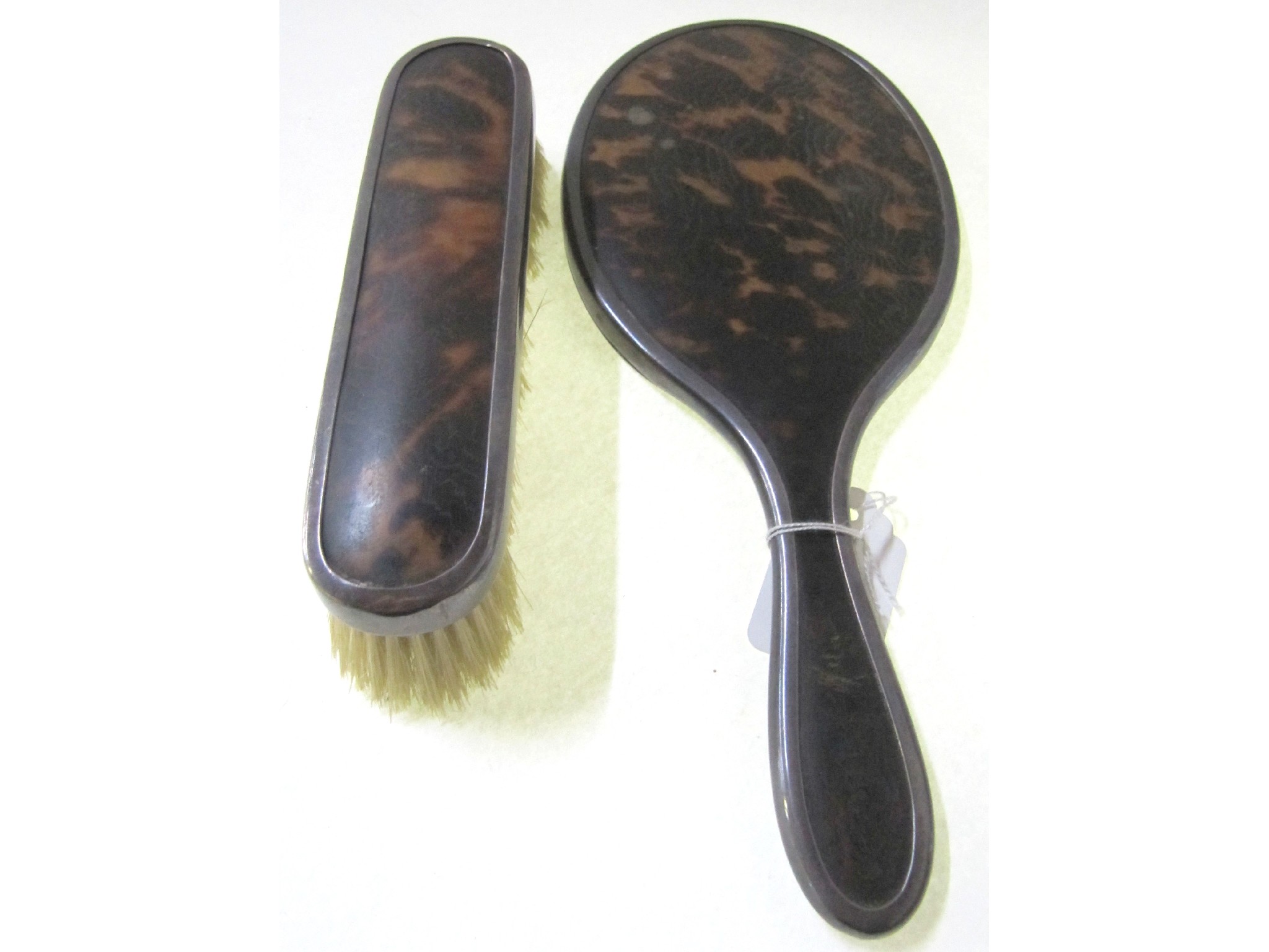 Appraisal: A silver and tortoiseshell brush and mirror set London