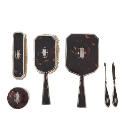 Appraisal: A George V nine piece silver and tortoiseshell inset brush