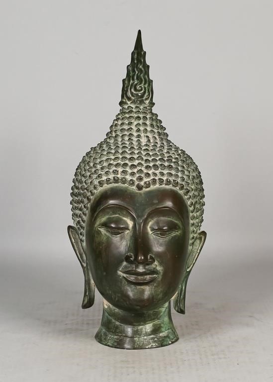 Appraisal: Bronze Thai Buddha head Cast with downcast eyes and pursed