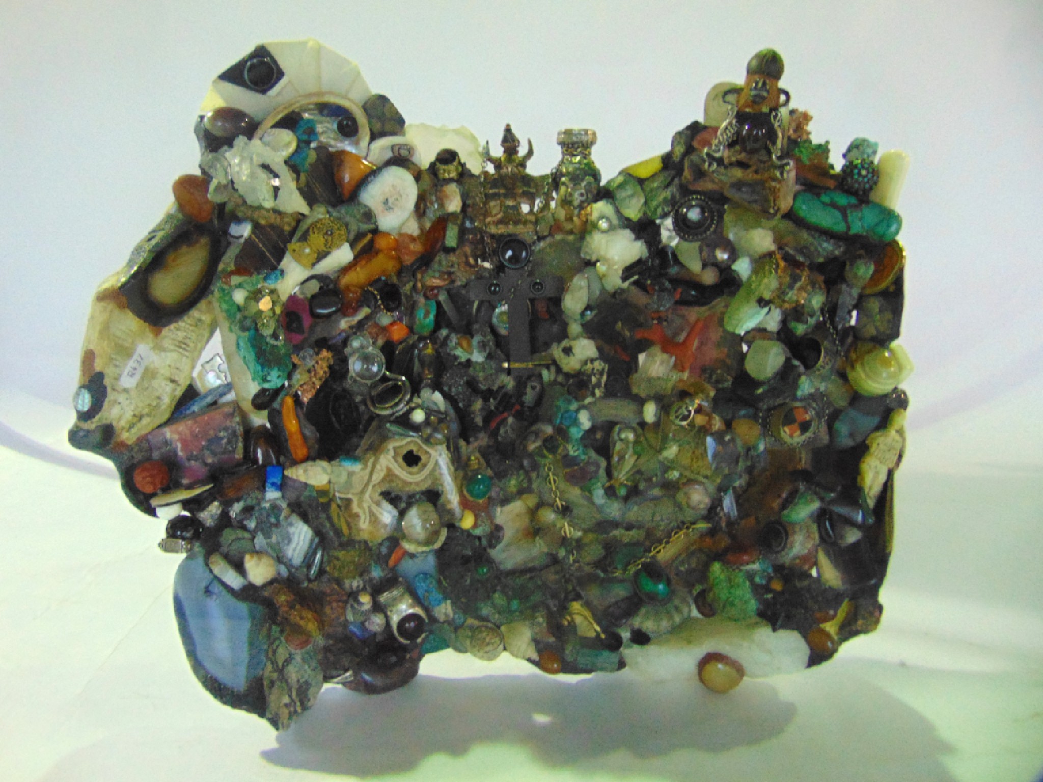 Appraisal: A substantial grotto sculpture composed from precious and semi precious