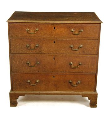 Appraisal: A George III oak chest the moulded edge top above