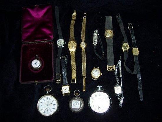 Appraisal: A lady's wristwatch the clasp stamped sundry pocket watches and