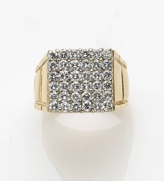 Appraisal: A diamond and k gold gent's ring estimated total diamond