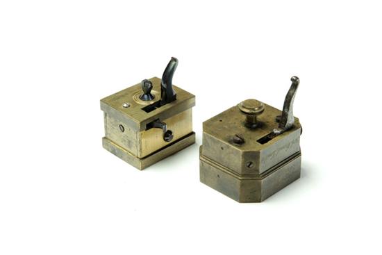 Appraisal: TWO SCARIFICATORS Nineteenth century brass Octagonal with twelve blades engraved