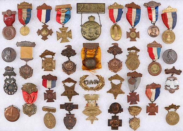 Appraisal: A GROUP OF CIVIL WAR GAR BADGES A GROUP OF