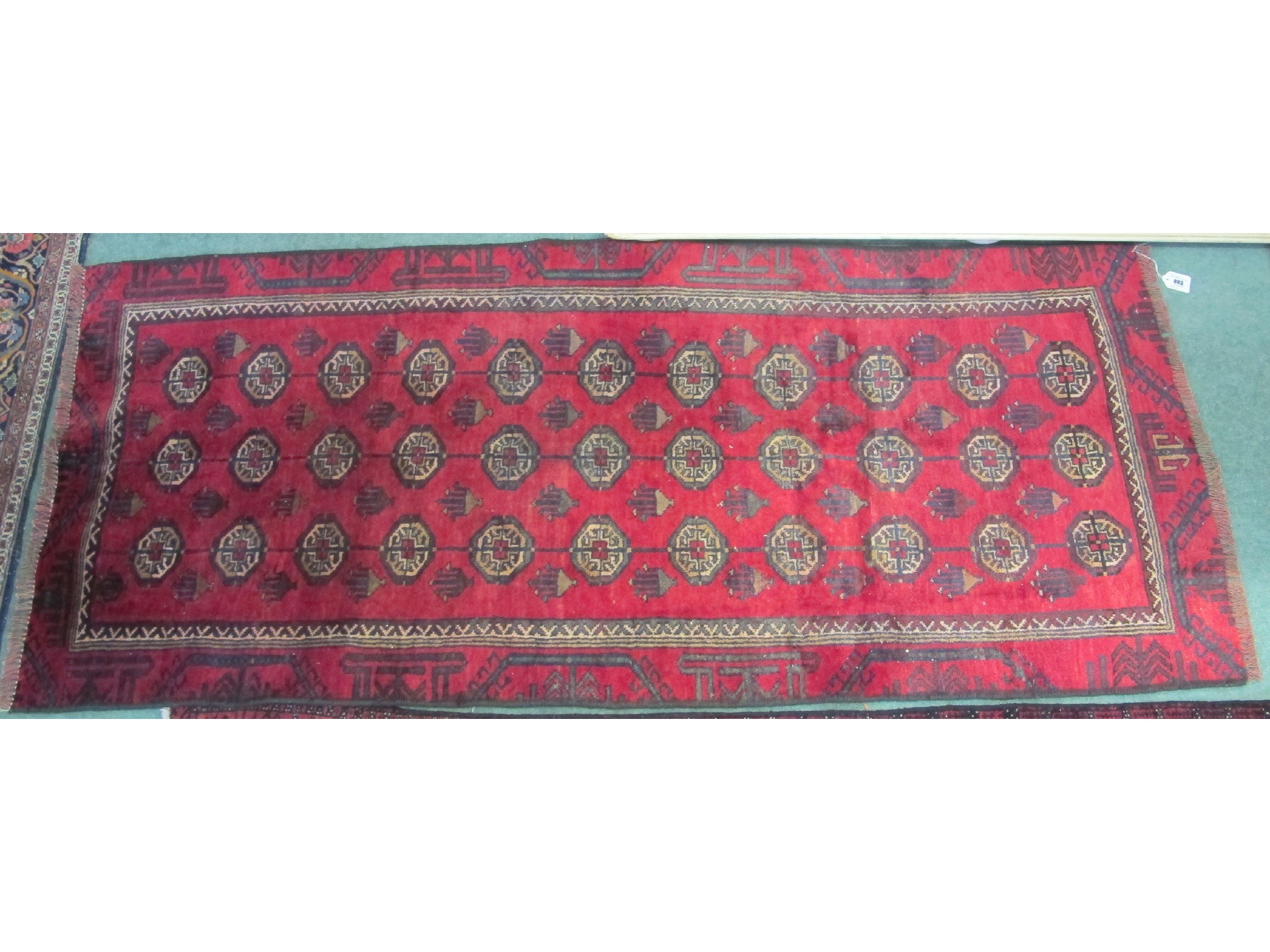 Appraisal: A red ground Baluchi runner x cm