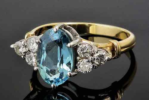 Appraisal: A modern ct gold mounted zircon and diamond dress ring