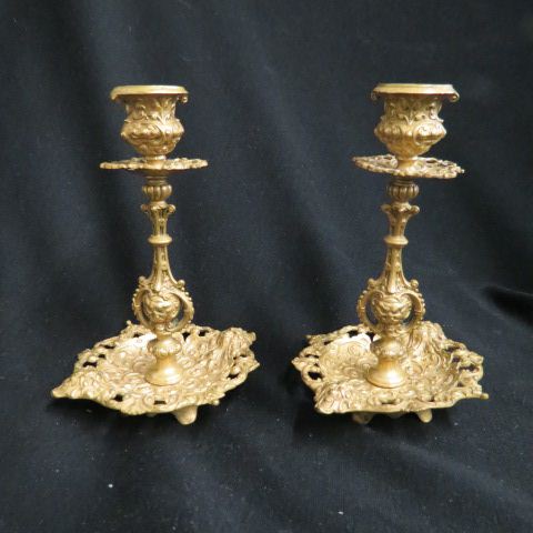 Appraisal: Pair of Victorian Brass Candlesticks footed rococo design