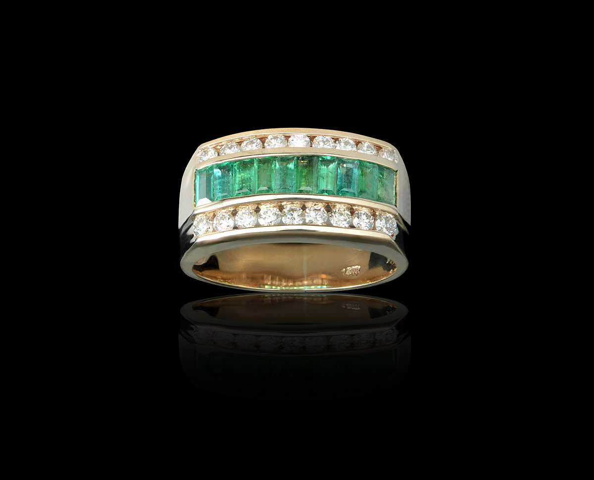 Appraisal: MEN'S OR LADIES DIAMOND AND EMERALD RING K yellow gold