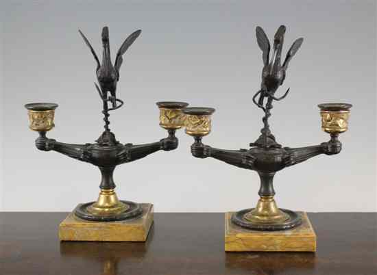 Appraisal: A pair of th century French bronze and brass twin