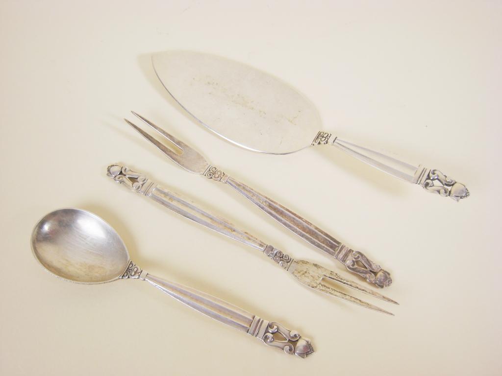 Appraisal: A Georg Jensen sterling silver Cake Server two Forks and