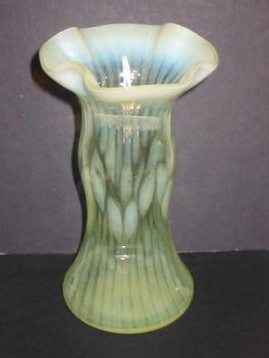 Appraisal: A VASELINE GLASS VASE of waisted form with frilled rim