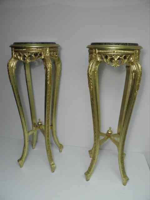 Appraisal: Pair of gilded carved wood marble top fern stands Green