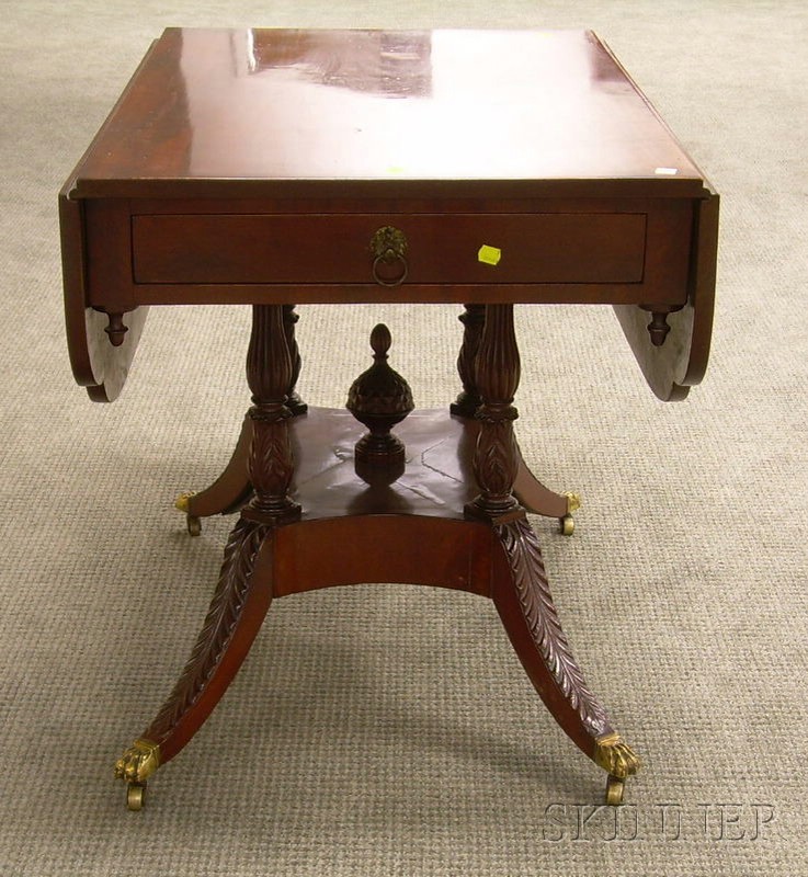 Appraisal: Classical Carved Mahogany Drop-leaf Pedestal-base Breakfast Table ht lg wd