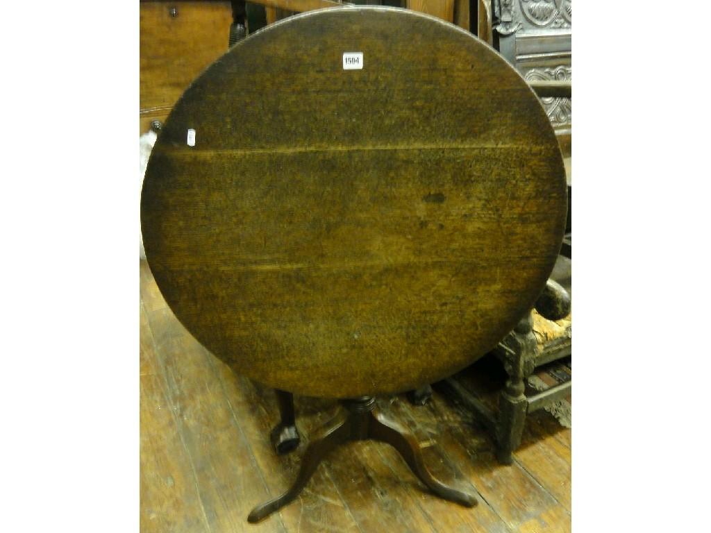 Appraisal: A th century oak snap top occasional table of circular