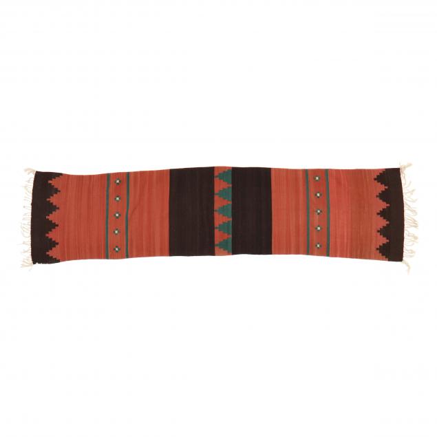 Appraisal: NAVAJO RUNNER Wool orange and brown panels with green cruciform