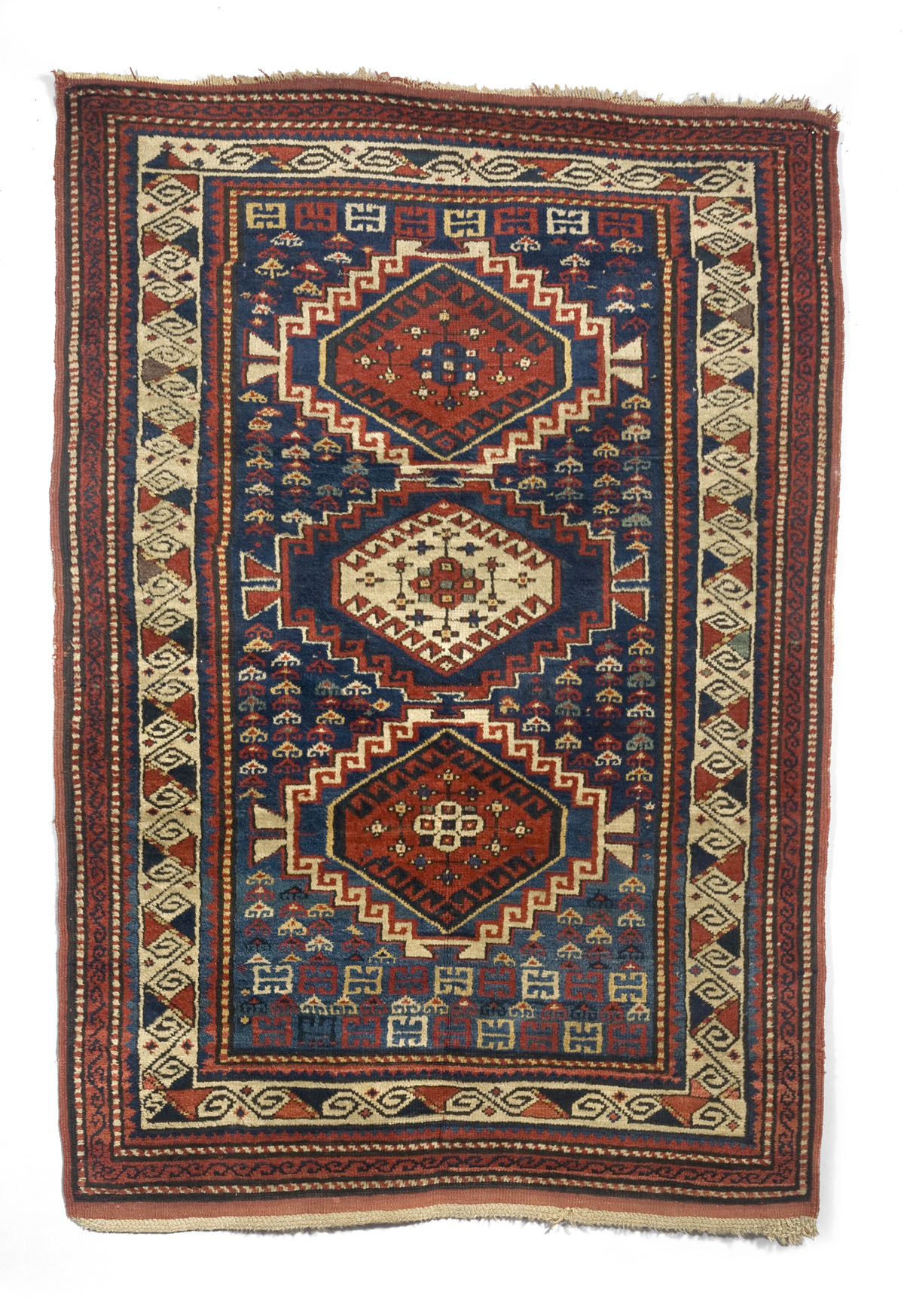 Appraisal: SOUTH CAUCASIAN RUG CIRCA The indigo field with three stepped