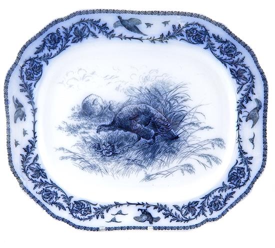 Appraisal: Cauldon England flow blue transferware turkey platter central image depicting