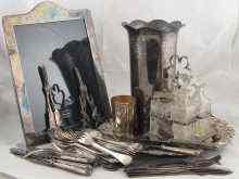 Appraisal: A quantity of silver plate including a mirror a four