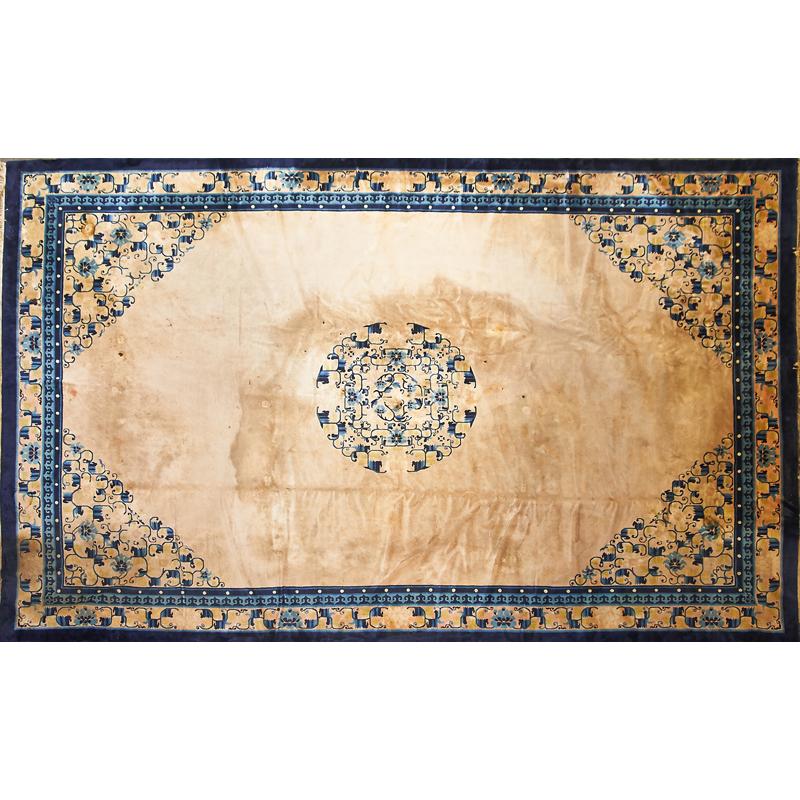 Appraisal: CHINESE PEKING ROOM SIZE RUG Blue floral designs on beige