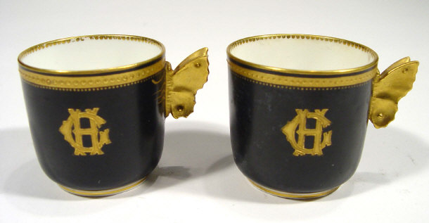 Appraisal: Two Victorian pottery cups with gilded butterfly handles and CH