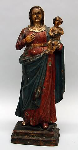 Appraisal: Virgin and Child red dress blue robe oblong plinth t