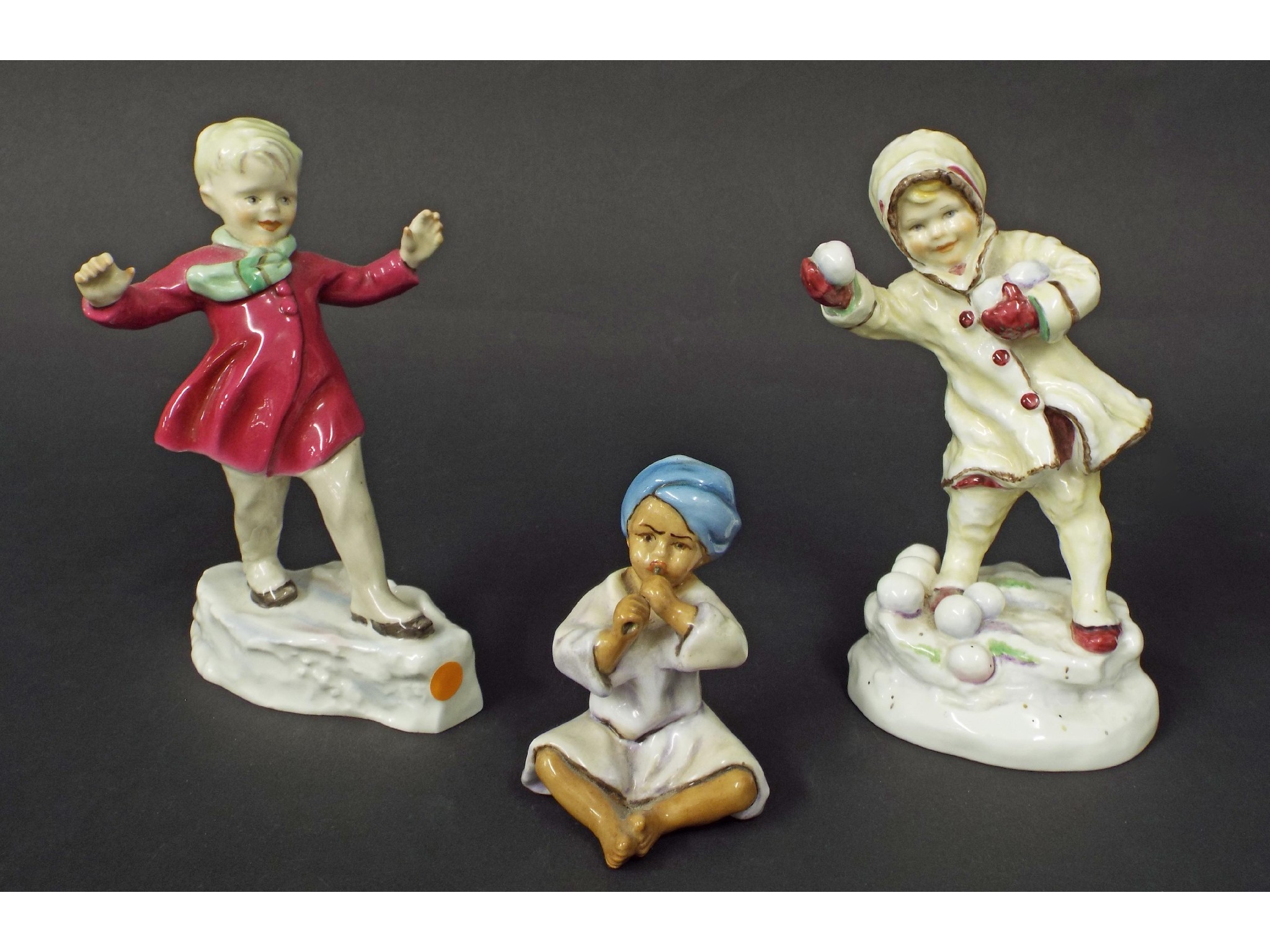 Appraisal: Three Royal Worcester porcelain figures 'December' 'January' and 'India'