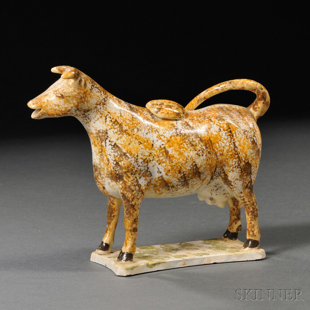 Appraisal: Staffordshire Earthenware Cow Creamer England c the standing figure sponge