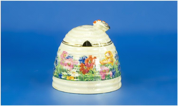 Appraisal: Clarice Cliff Honey Pot and Cover beehive shape radiance design