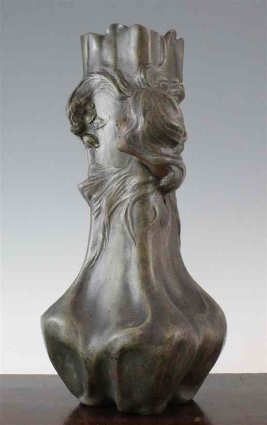 Appraisal: An Art Nouveau bronze spelter figural vase in Estimate -