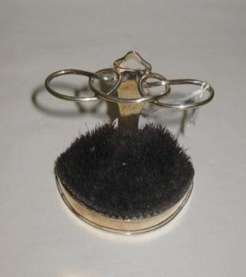 Appraisal: AN EDWARDIAN HAT PIN STAND modelled as a miniature stick