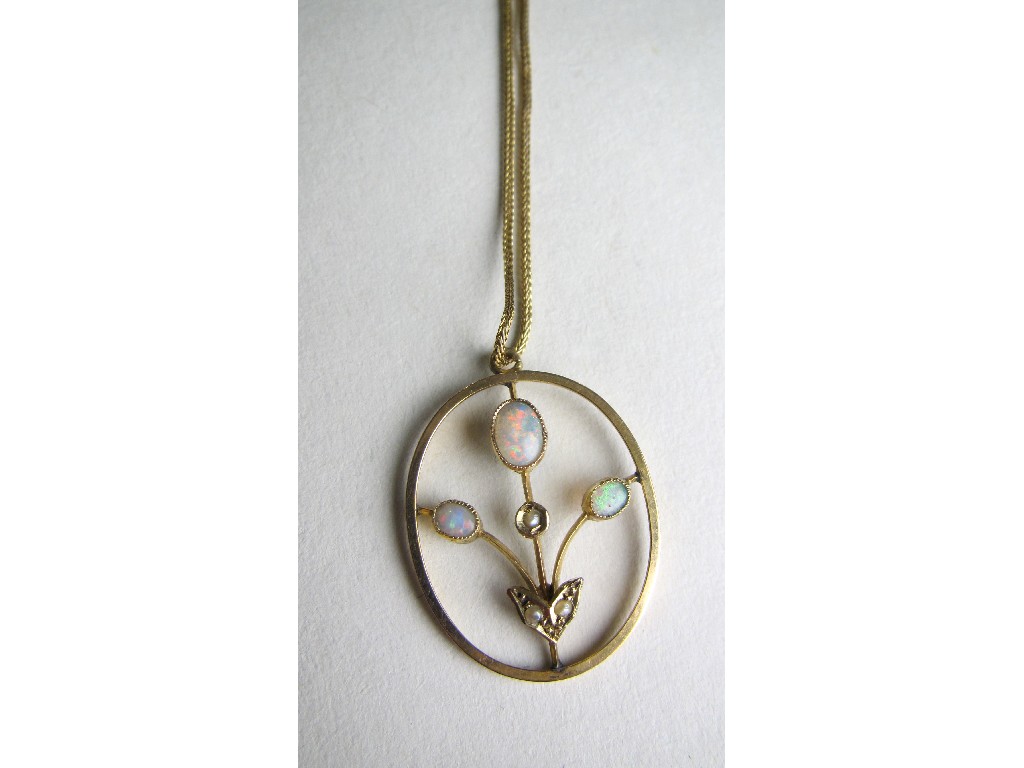 Appraisal: Edwardian style gold pendant set with opal and seed pearls