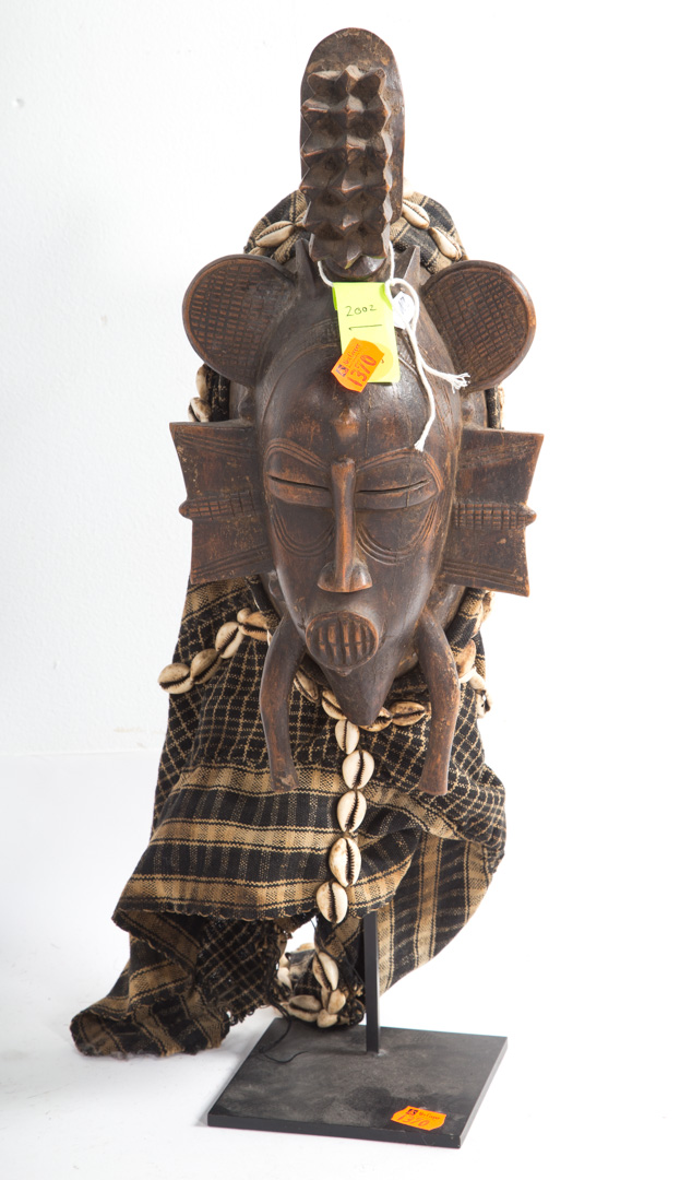 Appraisal: Senufo wood keplie mask carved wood with cloth and cowries