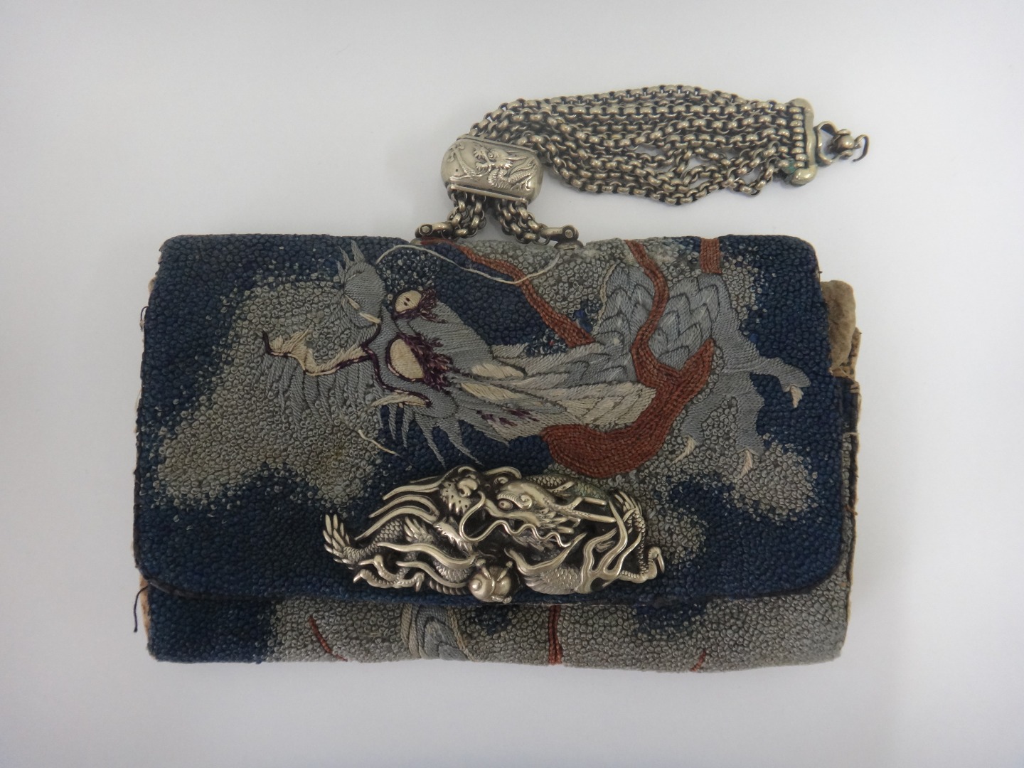 Appraisal: A Japanese tobacco pouch Meiji worked with various stitches with