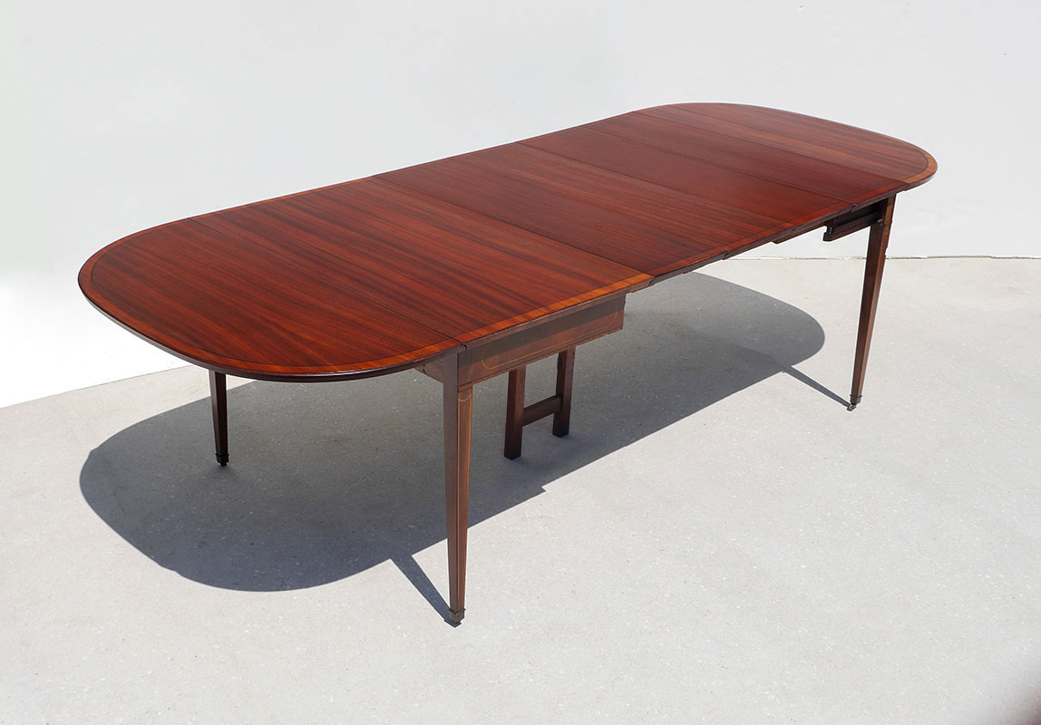 Appraisal: MAHOGANY BANDED INLAY DROP LEAF DINING TABLE Banded mahogany rectangular