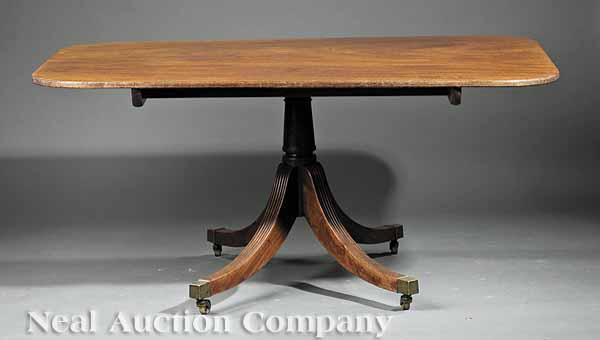 Appraisal: A Regency Carved Mahogany Tilt-Top Breakfast Table c reeded oblong