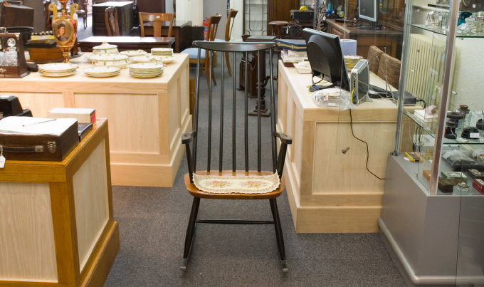 Appraisal: Wooden Rocking Chair Stained Black Back Arms and Legs with